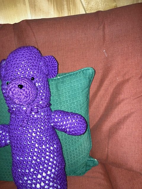 A Purple Crocheted Teddy Bear